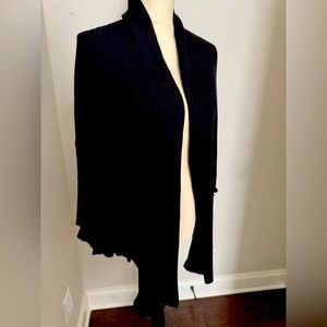 Soft surroundings, black cardigan sweater with ruffle trim. Size M-never worn.
￼
